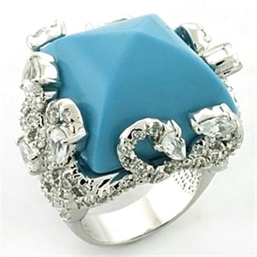JCEA683 Rhodium Brass Ring with Synthetic Turquoise in Sea Blue